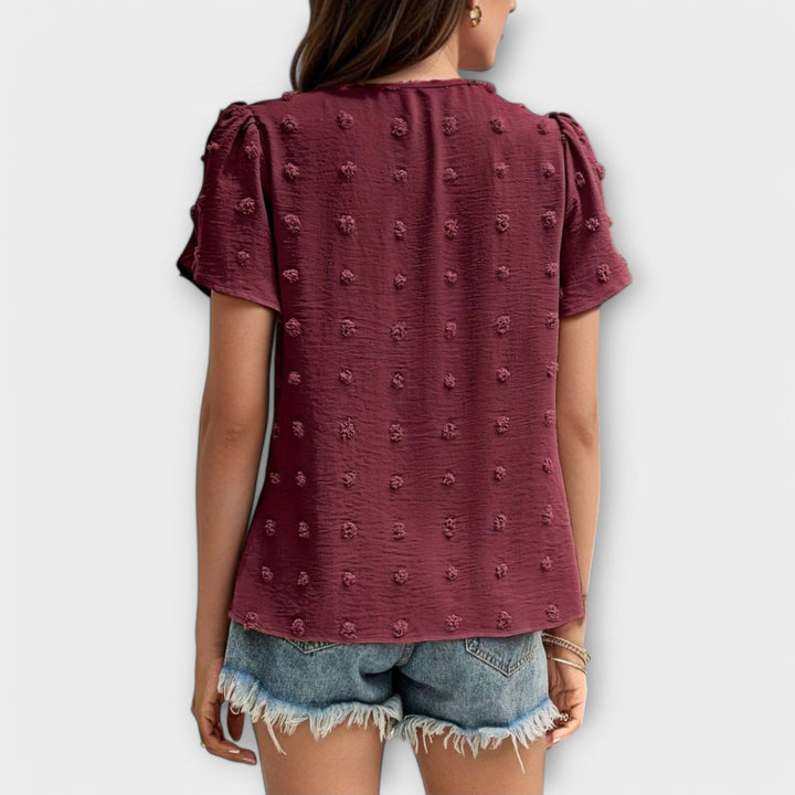 Charlotte - Den perfekte polkaprikkede bluse