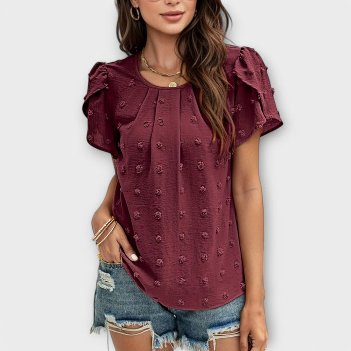 Charlotte - Den perfekte polkaprikkede bluse