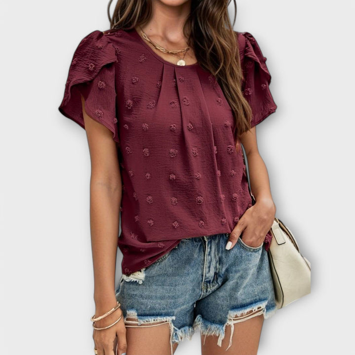 Charlotte - Den perfekte polkaprikkede bluse