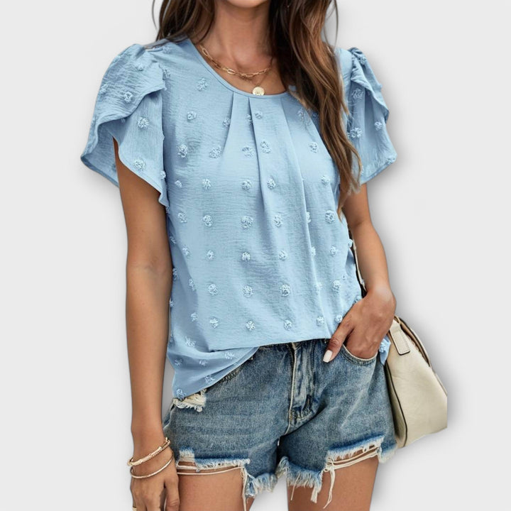 Charlotte - Den perfekte polkaprikkede bluse
